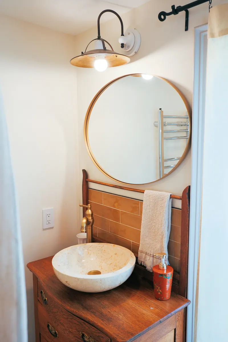 The basin and mirror in the Provence bathroom.